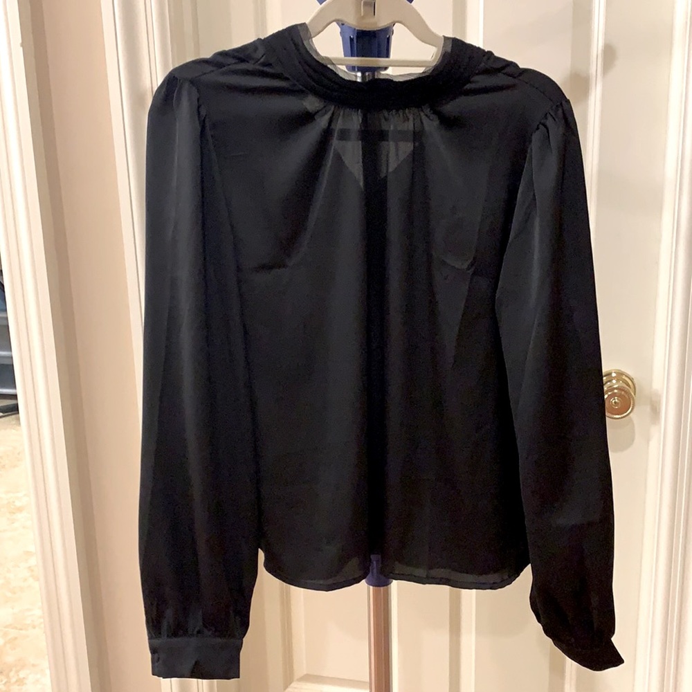 Lightweight black satin blouse.